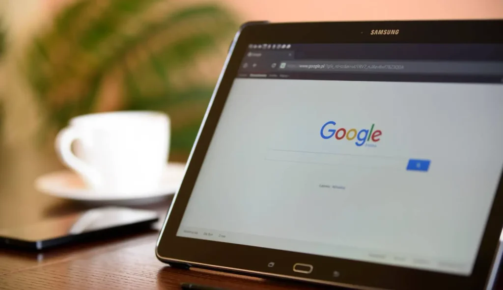 A pest control company’s Google Business Profile displayed on a laptop, showing positive reviews and increased online visibility.